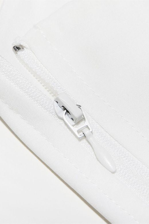 Woman wearing a figure flattering Valerie Corset Crop Top - Pearl White BODYCON COLLECTION