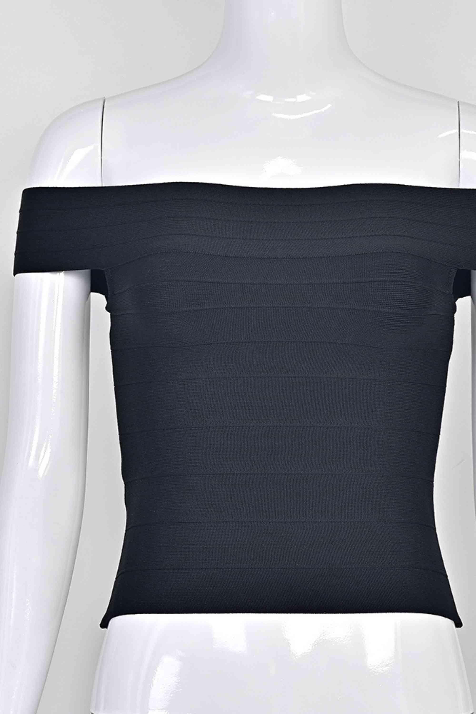 Woman wearing a figure flattering Vera Bandage Off Shoulder Top - Classic Black BODYCON COLLECTION Pty Ltd