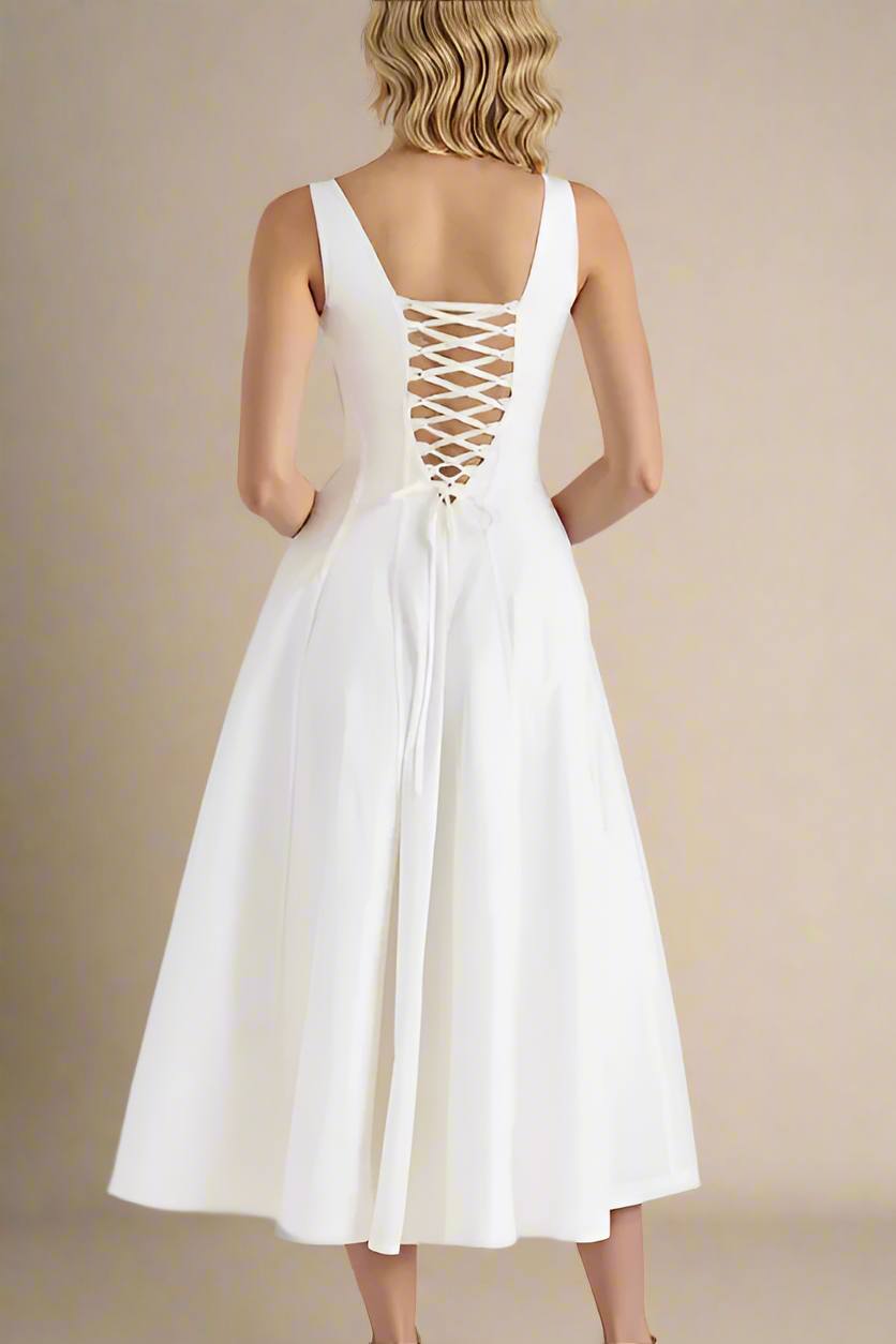 Woman wearing a figure flattering Willa Bodycon Midi Dress - White Pearl BODYCON COLLECTION Pty Ltd