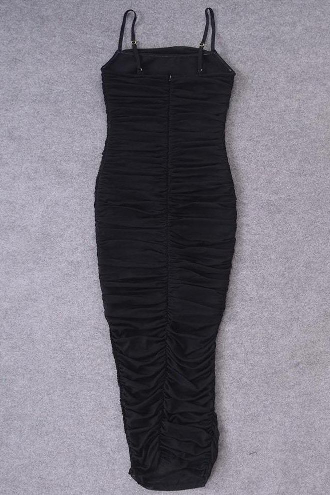 Woman wearing a figure flattering Zoe Bodycon Wrap Maxi Dress - Classic Black Bodycon Collection