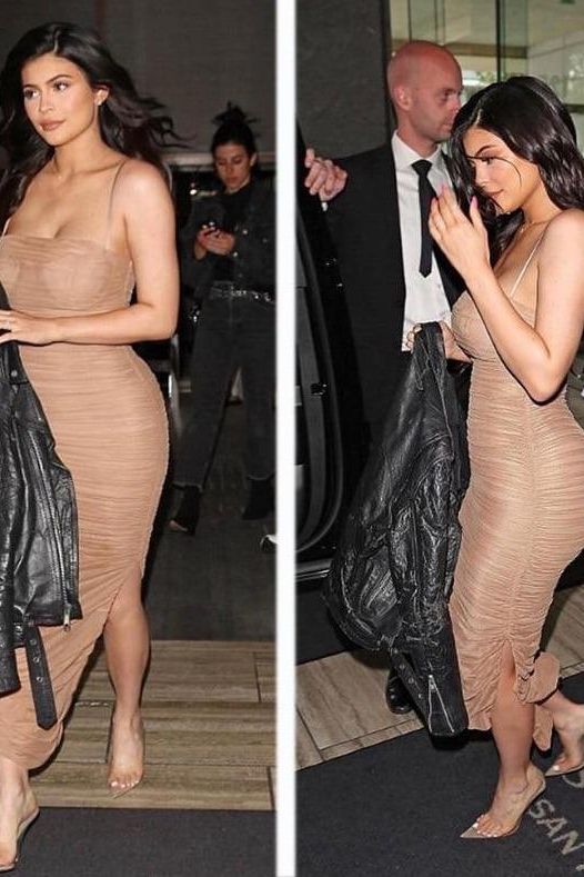 Woman wearing a figure flattering Zoe Bodycon Wrap Maxi Dress - Tan Brown Bodycon Collection