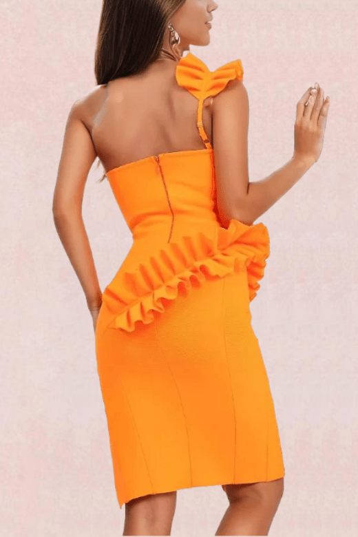 Woman wearing a figure flattering  Aimee Bodycon Dress - Apricot Orange BODYCON COLLECTION