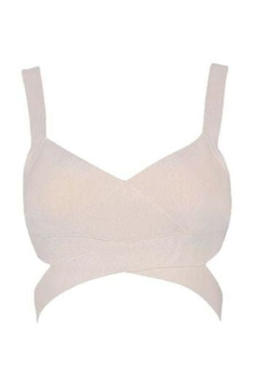 Woman wearing a figure flattering  Ang Bandage Crop Top - Cream BODYCON COLLECTION