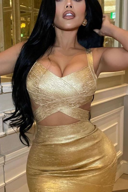 Woman wearing a figure flattering  Ang Bandage Crop Top - Gold BODYCON COLLECTION