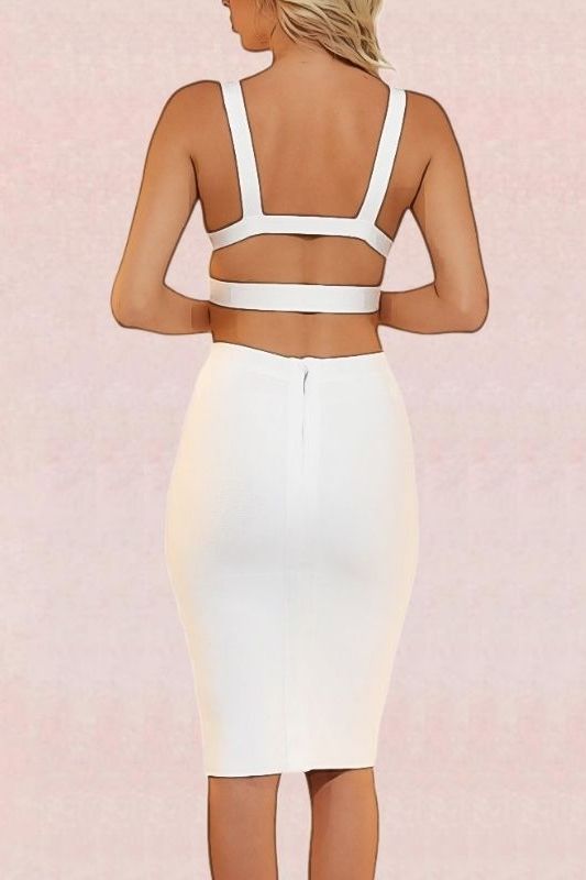 Woman wearing a figure flattering  Ang Bandage Top and Knee Length Skirt Set - Pearl White BODYCON COLLECTION