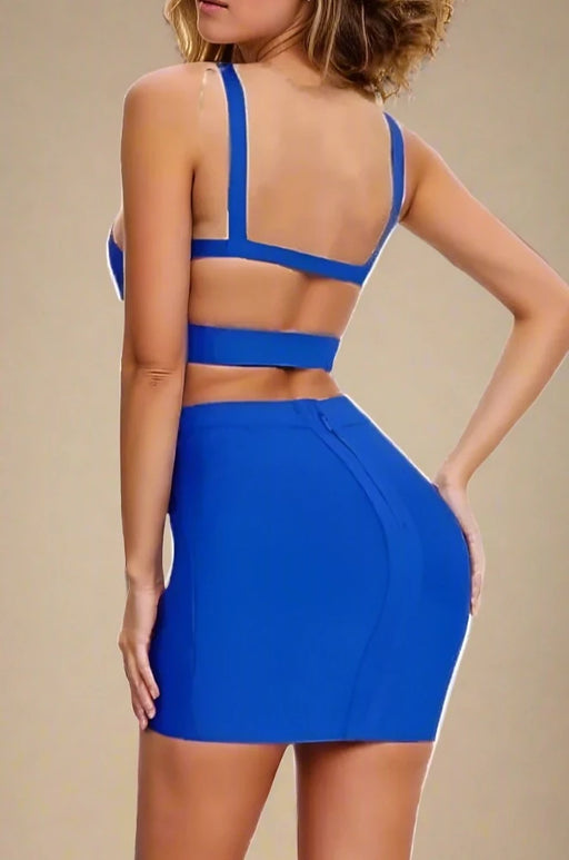 Woman wearing a figure flattering  Ang Bandage Top and Mini Skirt Set - Royal Blue BODYCON COLLECTION