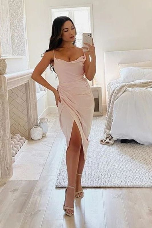Woman wearing a figure flattering  Angela Bodycon Dress - Dusty Pink BODYCON COLLECTION