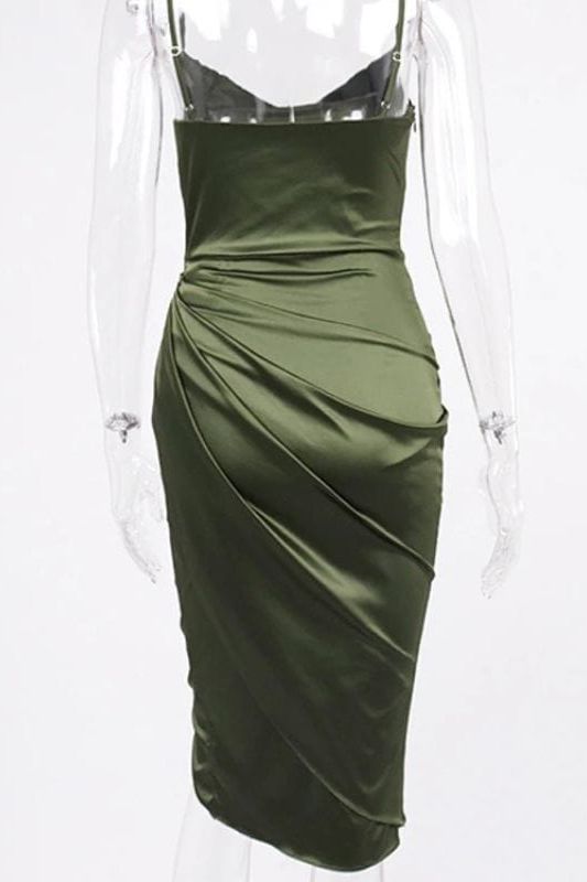 Woman wearing a figure flattering  Angela Bodycon Dress - Emerald Green BODYCON COLLECTION