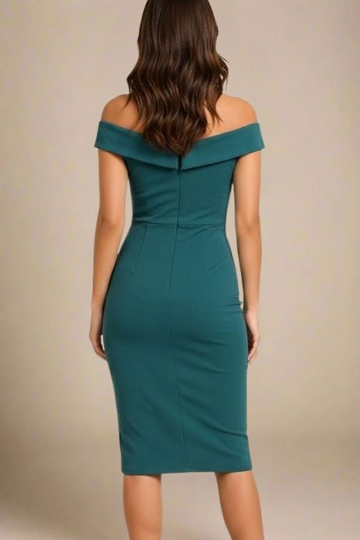 Woman wearing a figure flattering  Ash Bandage Dress - Emerald Green Bodycon Collection
