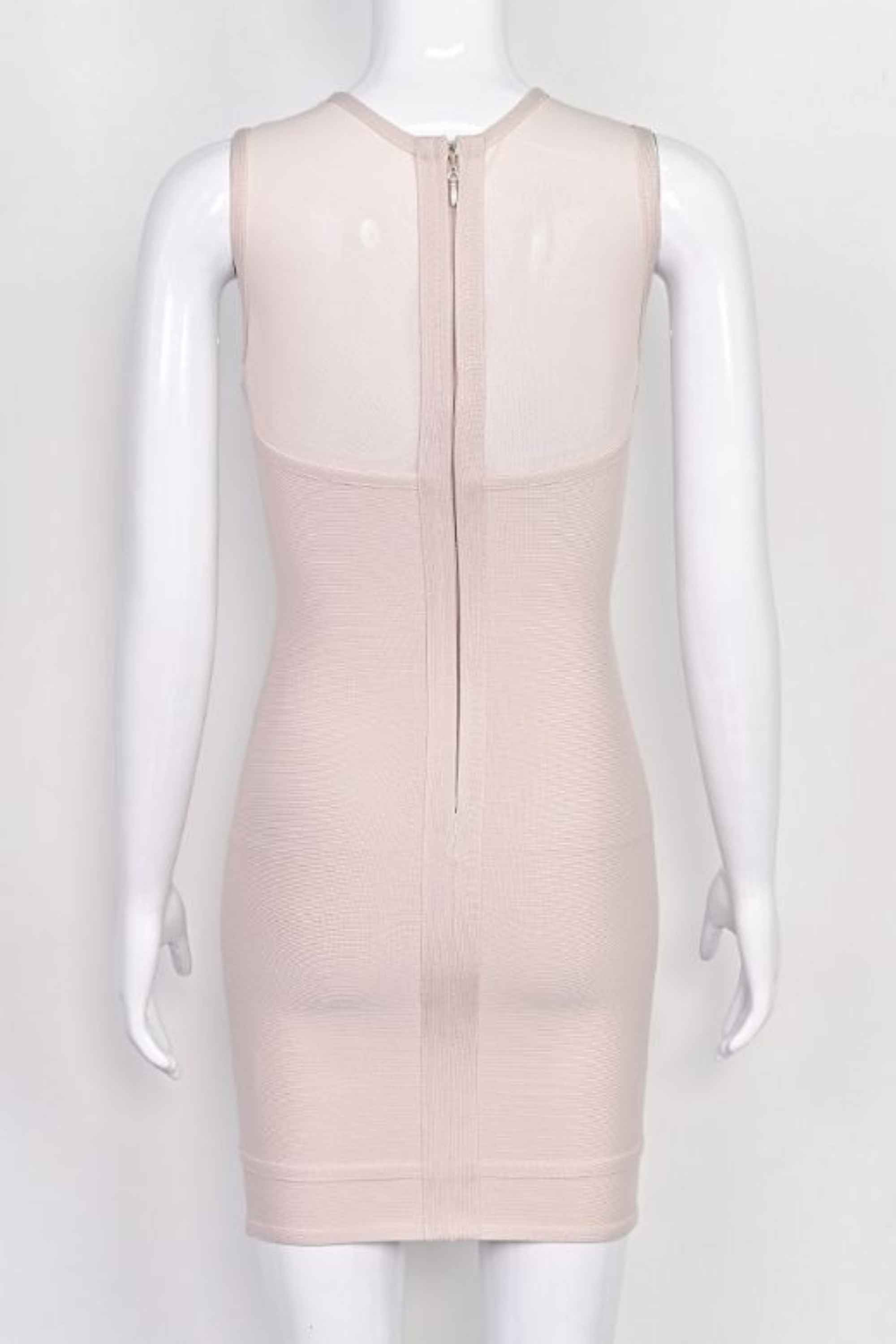 Woman wearing a figure flattering  Aspen Bodycon Mini Dress - Nude BODYCON COLLECTION Pty Ltd