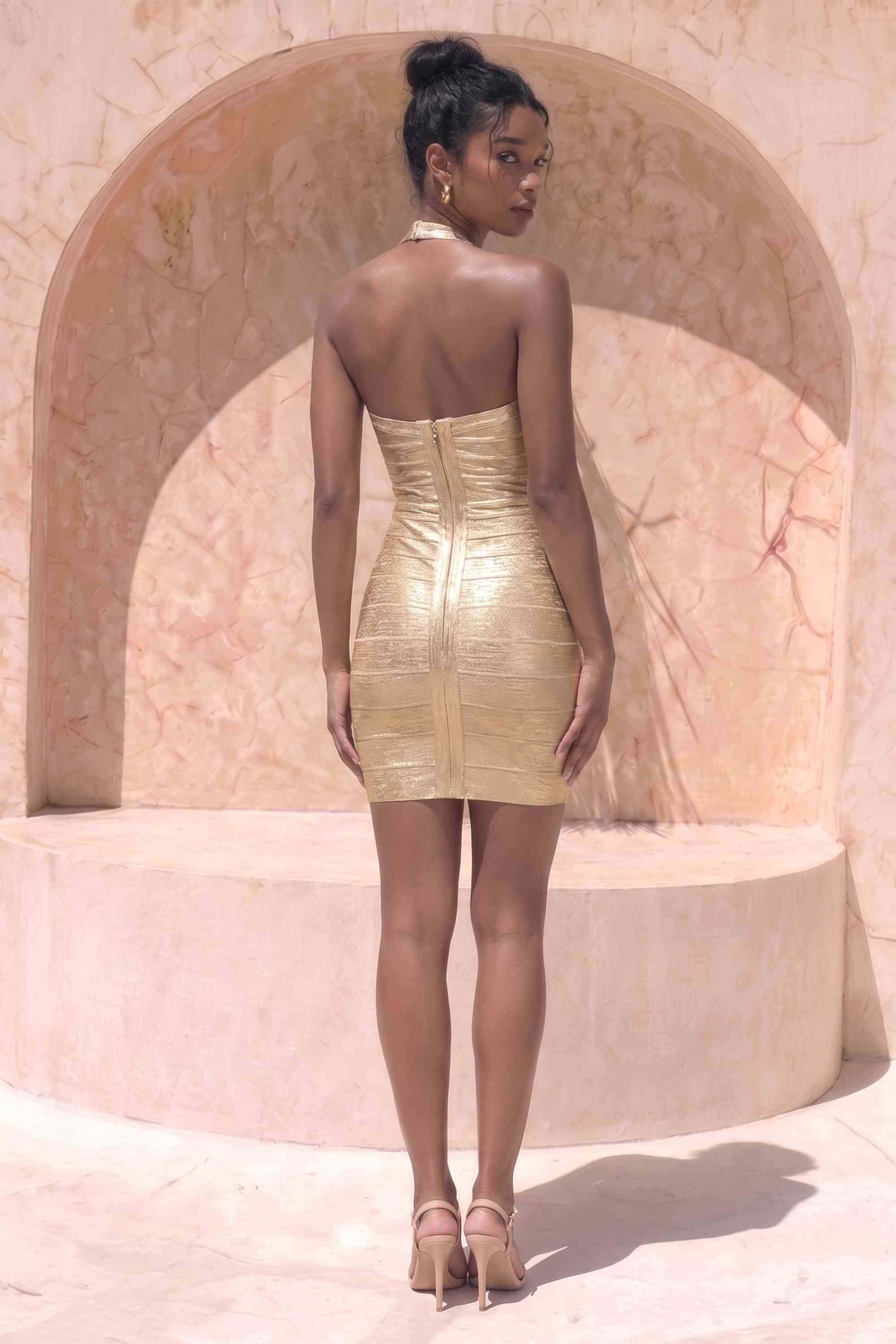 Woman wearing a figure flattering  Athena Bandage Mini Dress - Gold BODYCON COLLECTION Pty Ltd