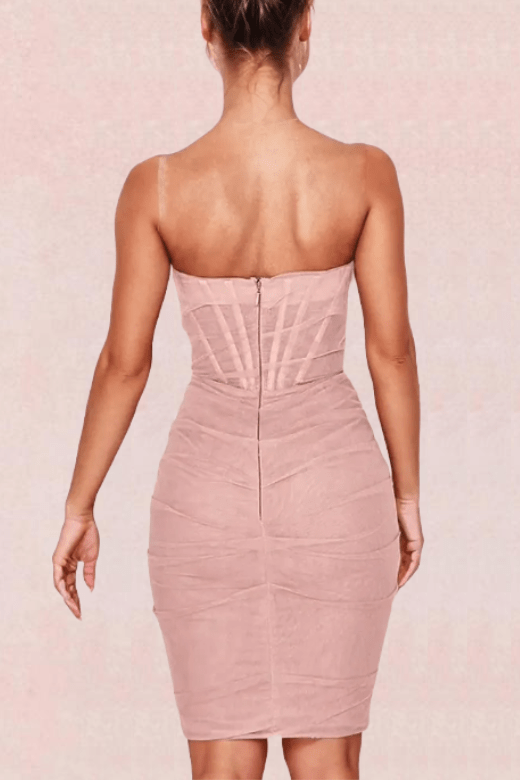 Woman wearing a figure flattering  Athena Bodycon Wrap Dress - Dusty Pink BODYCON COLLECTION