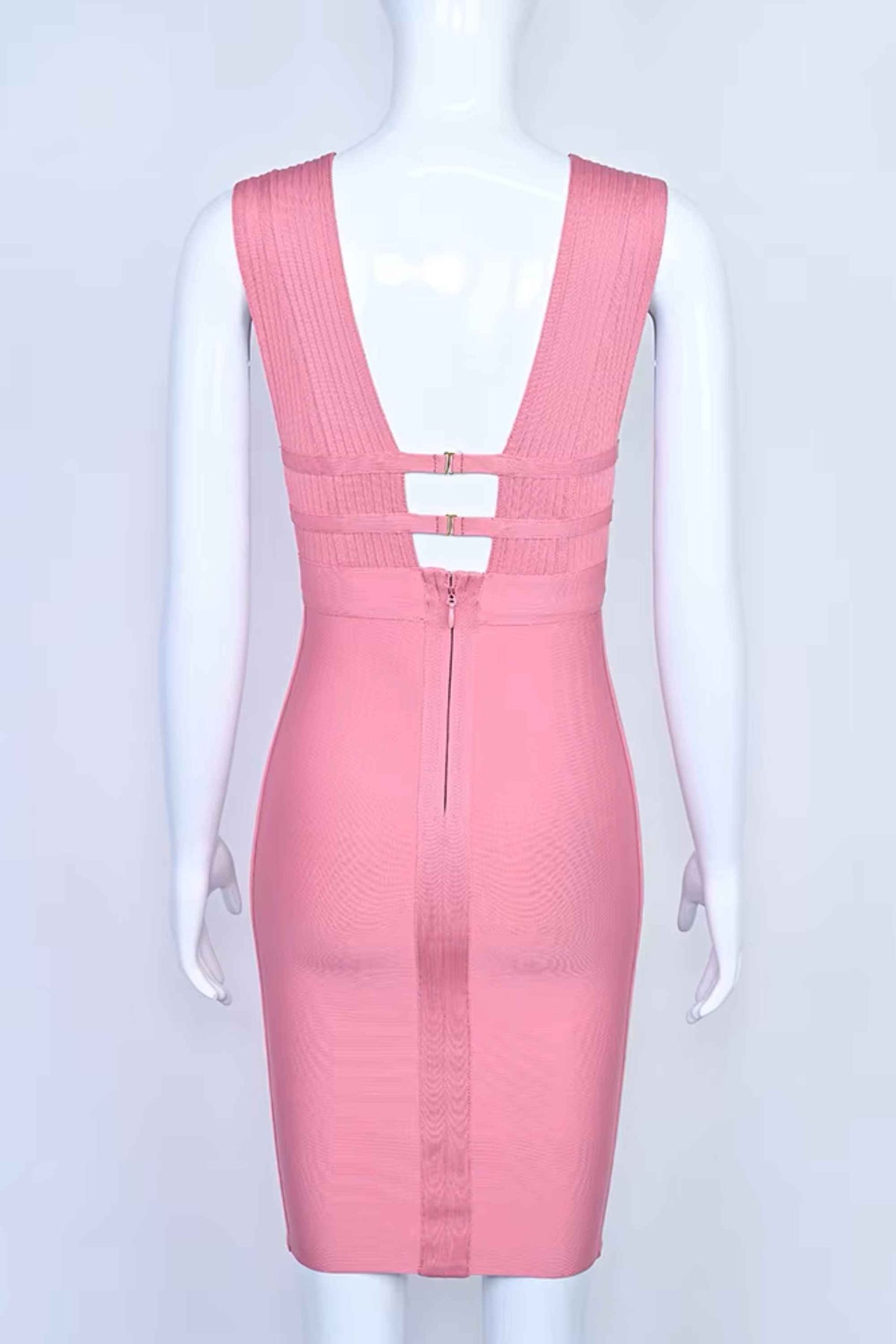 Woman wearing a figure flattering  Bay Bandage Dress - Ballet Pink Bodycon Collection