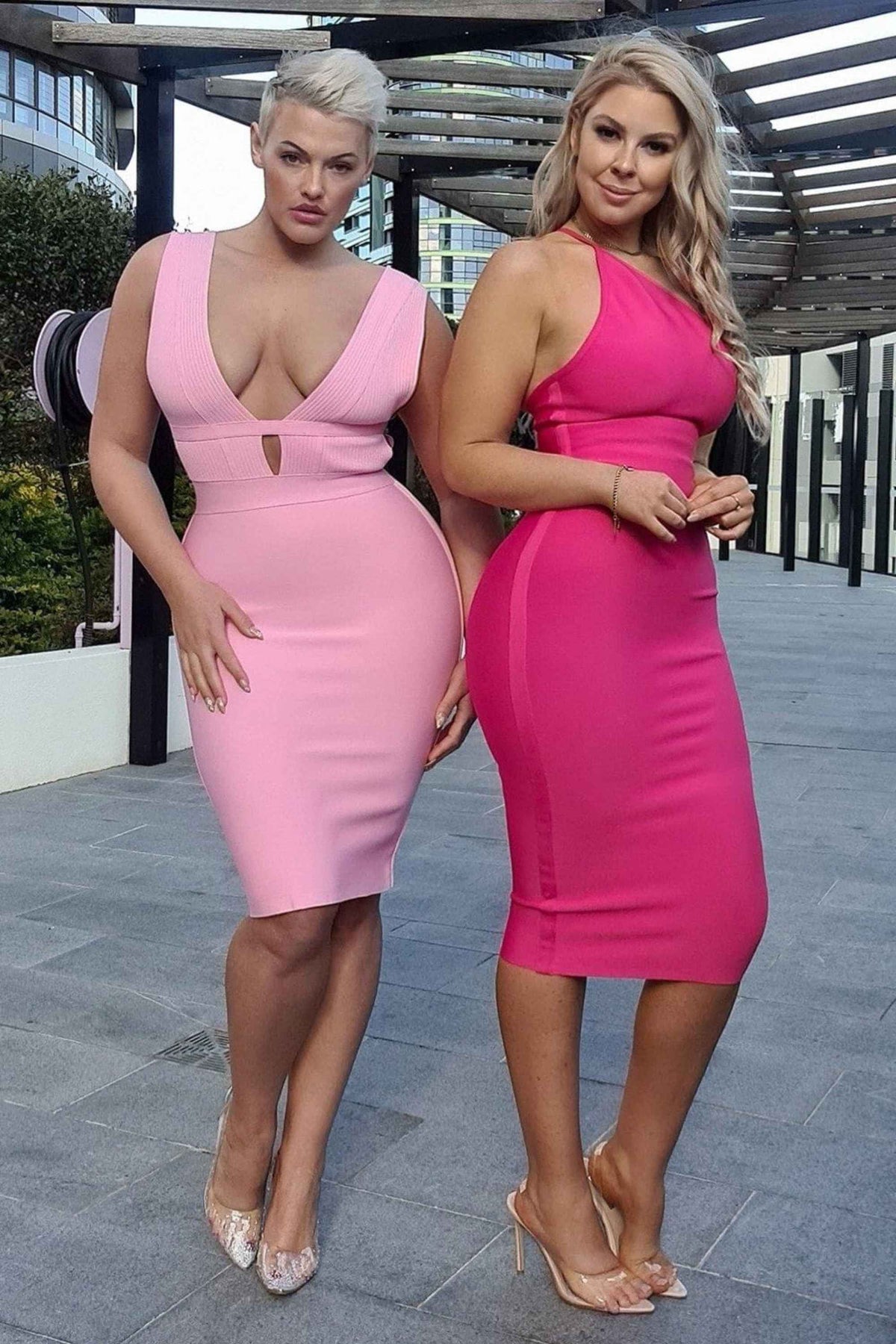 Woman wearing a figure flattering  Bay Bandage Dress - Blush Pink Bodycon Collection