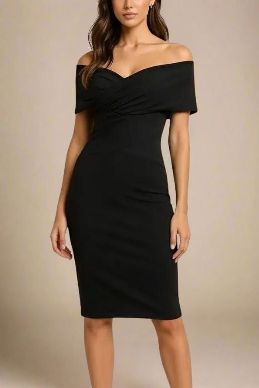 Woman wearing a figure flattering  Bea Bandage Dress - Classic Black Bodycon Collection