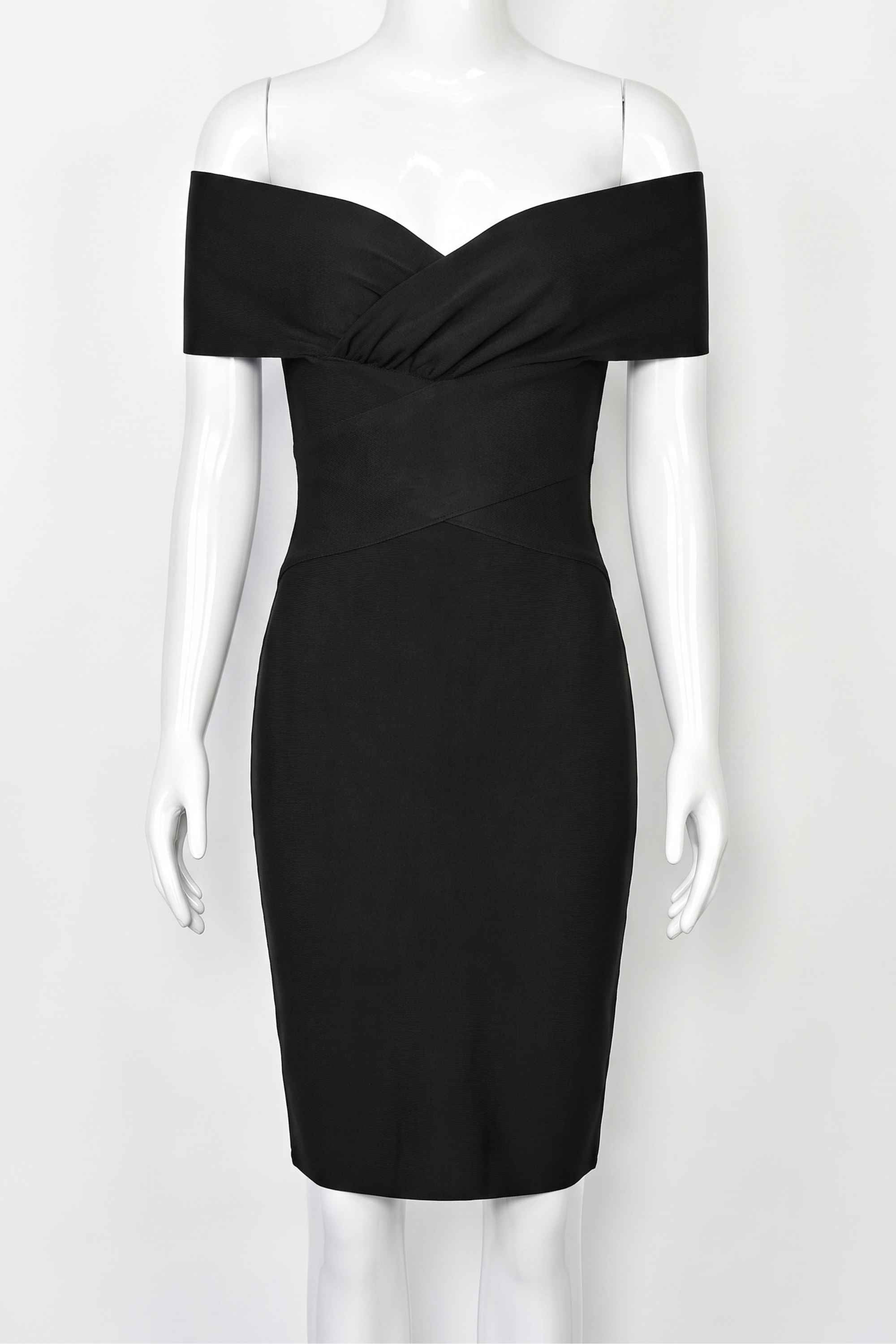 Woman wearing a figure flattering  Bea Bandage Dress - Classic Black Bodycon Collection