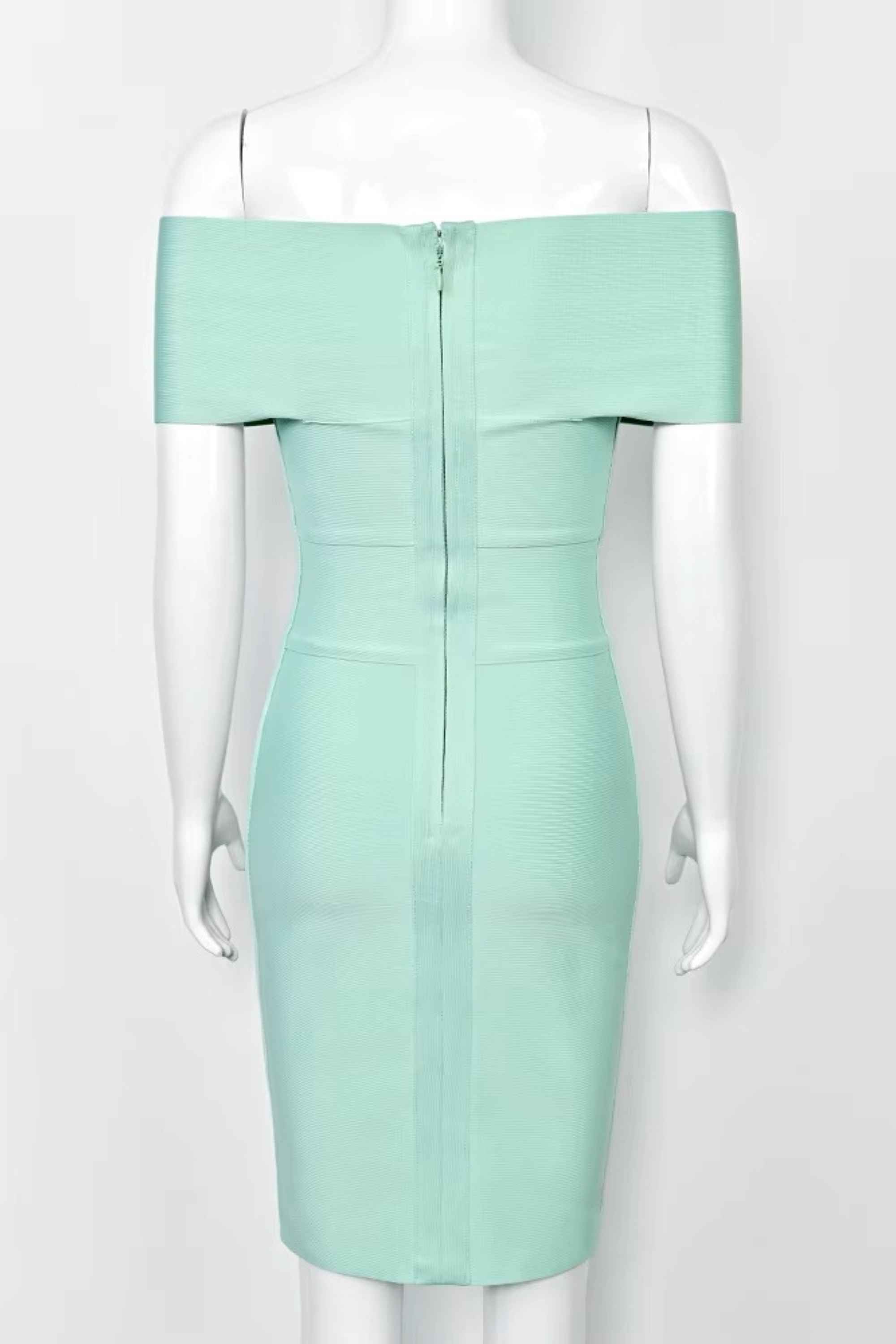 Woman wearing a figure flattering  Bea Bandage Dress - Mint Green Bodycon Collection