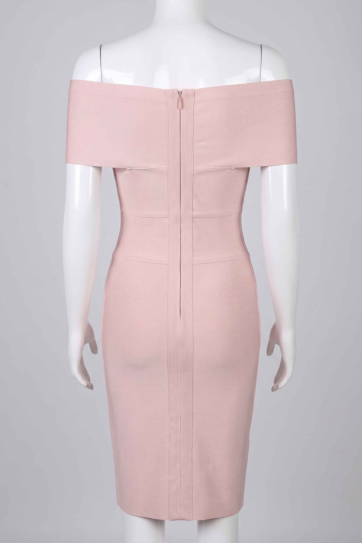 Woman wearing a figure flattering  Bea Bandage Dress - Nude Bodycon Collection