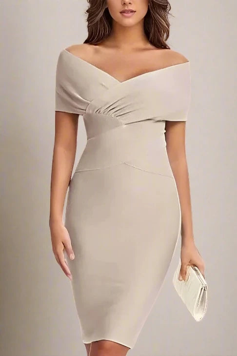 Woman wearing a figure flattering  Bea Bandage Dress - Nude Bodycon Collection