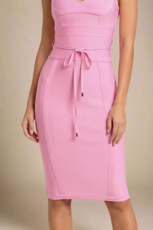 Woman wearing a figure flattering  Bek Bandage Dress - Blush Pink Bodycon Collection