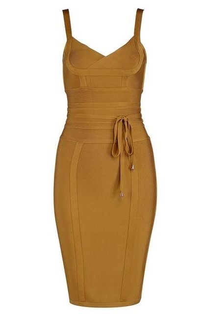 Woman wearing a figure flattering  Bek Bandage Dress - Mustard Yellow Bodycon Collection