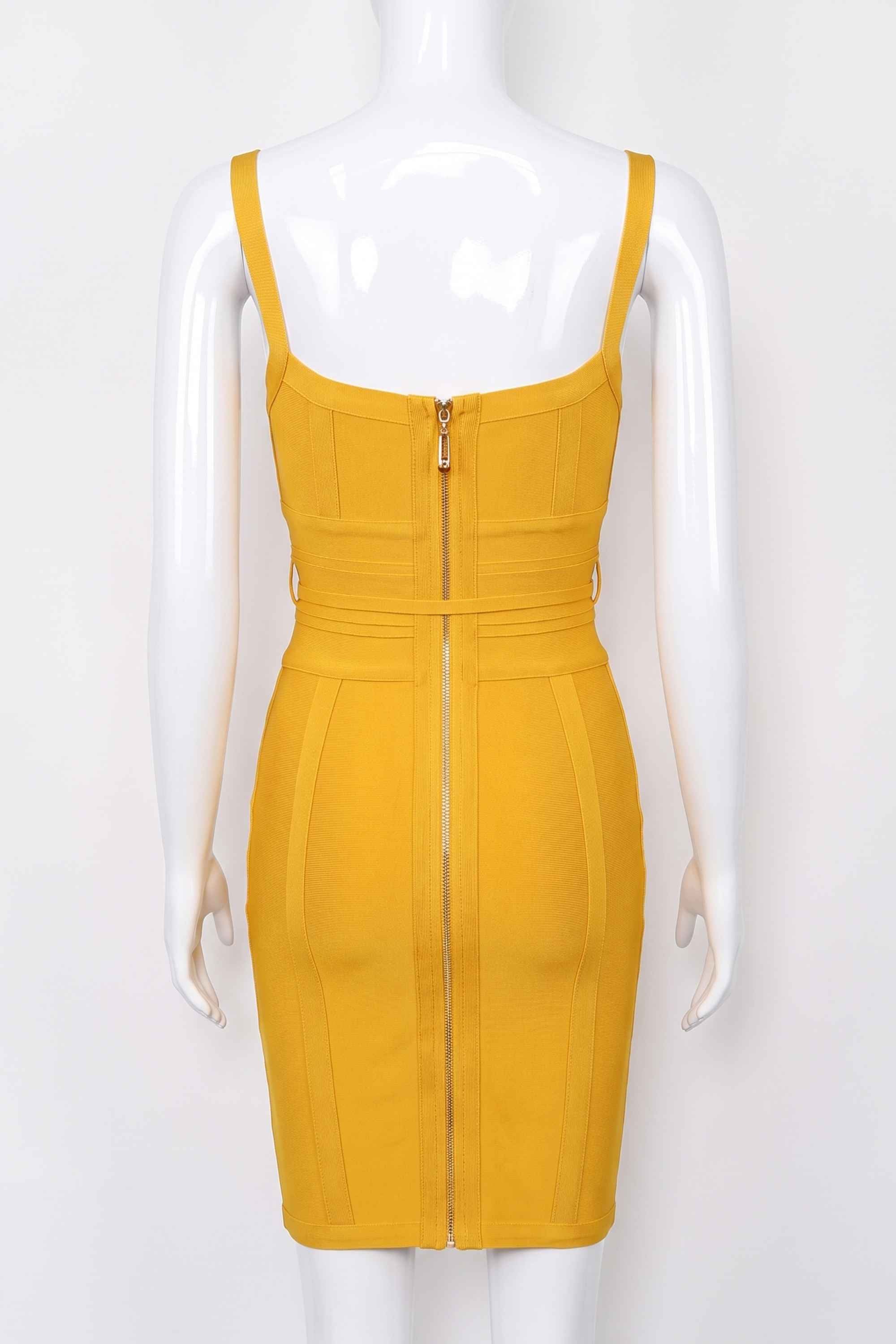 Woman wearing a figure flattering  Bek Bandage Dress - Mustard Yellow Bodycon Collection