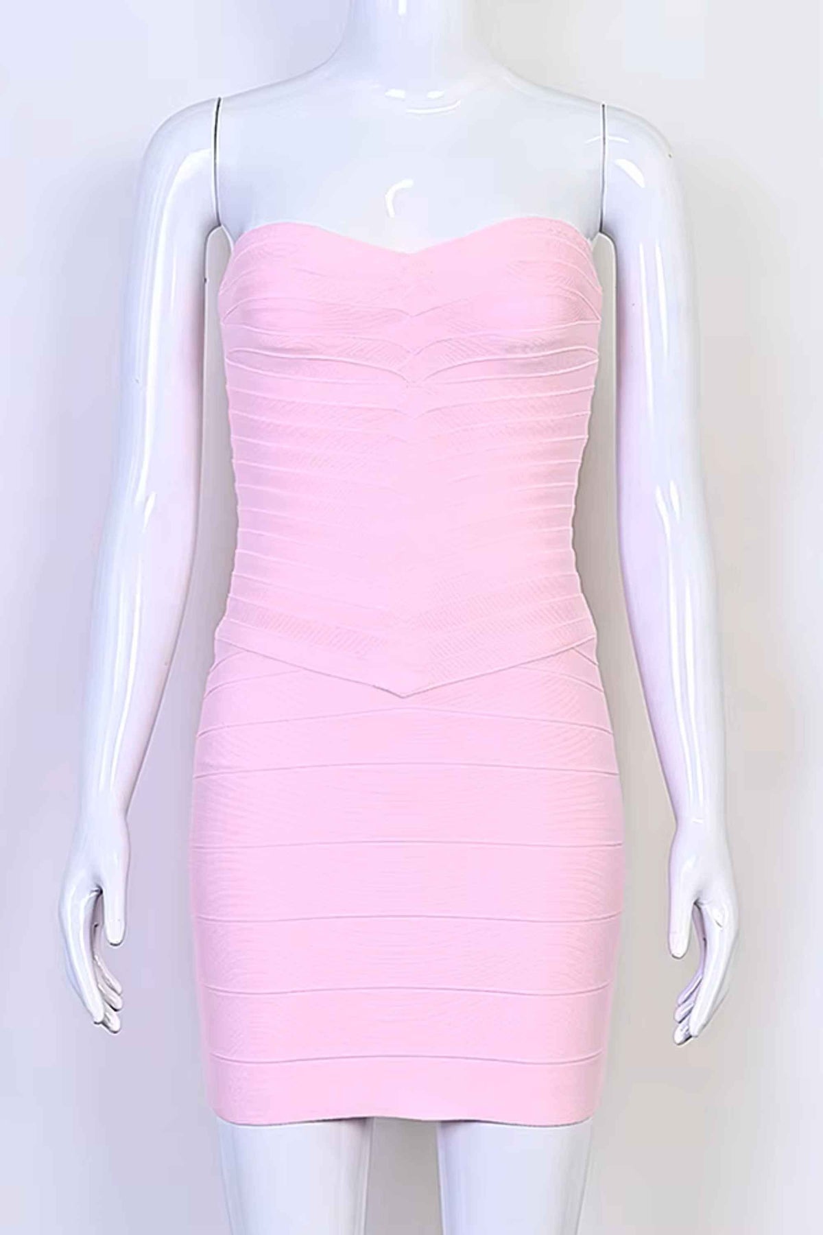 Woman wearing a figure flattering  Belle Bandage Mini Dress - Dusty Pink BODYCON COLLECTION Pty Ltd
