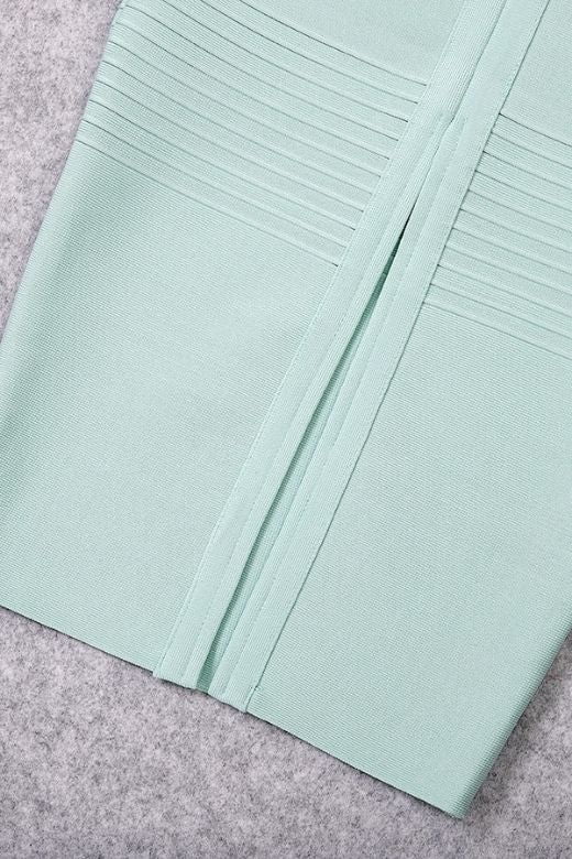 Woman wearing a figure flattering  Billie Bandage Midi Dress - Mint Green Bodycon Collection