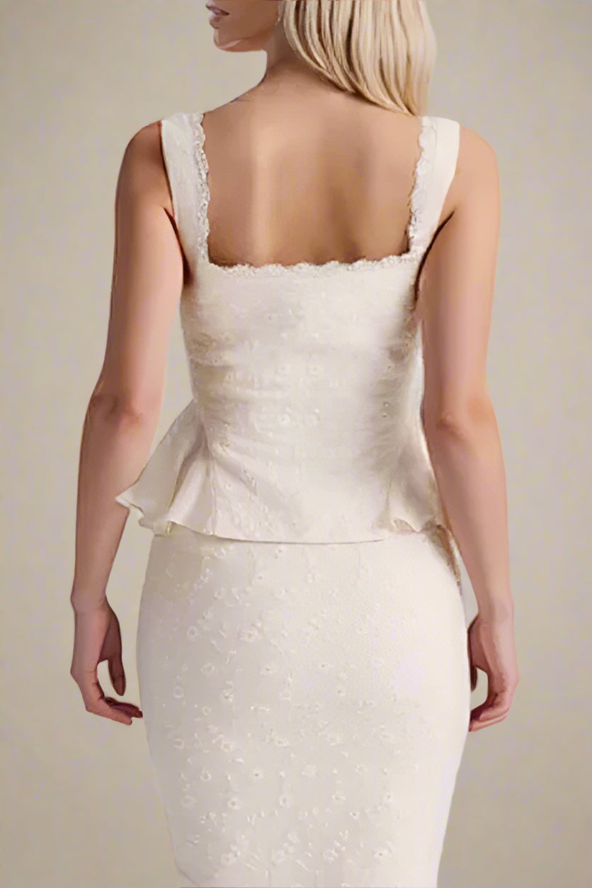 Woman wearing a figure flattering  Cali Wrap Top - Ivory White BODYCON COLLECTION