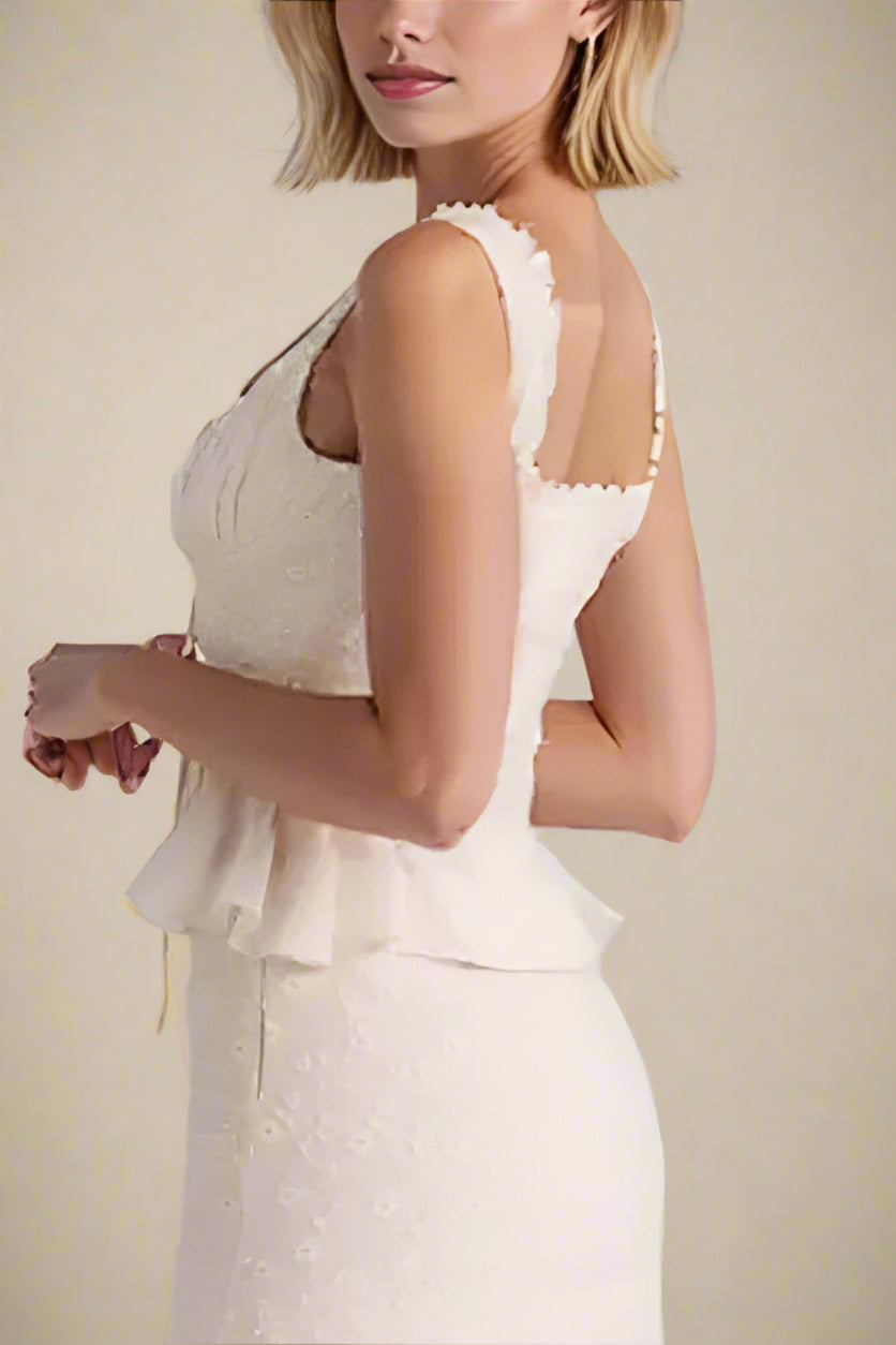 Woman wearing a figure flattering  Cali Wrap Top - Ivory White BODYCON COLLECTION
