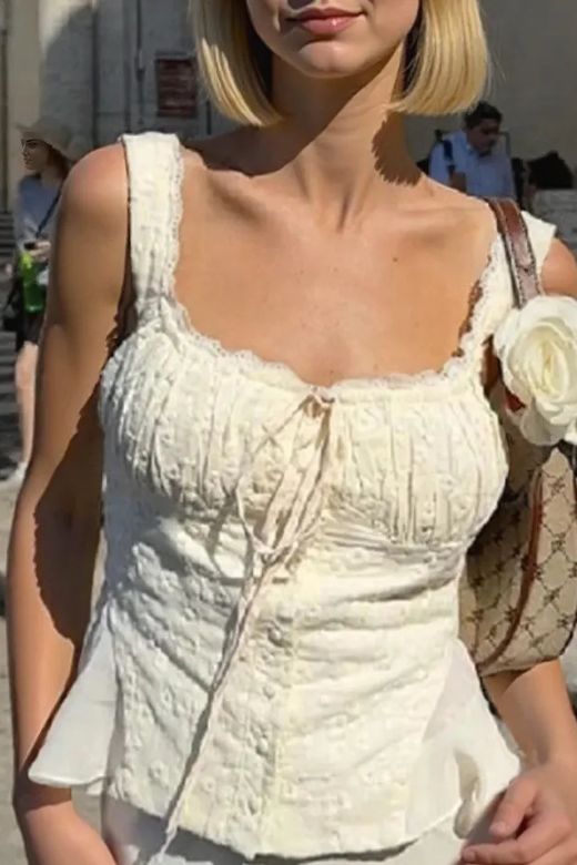 Woman wearing a figure flattering  Cali Wrap Top - Ivory White BODYCON COLLECTION