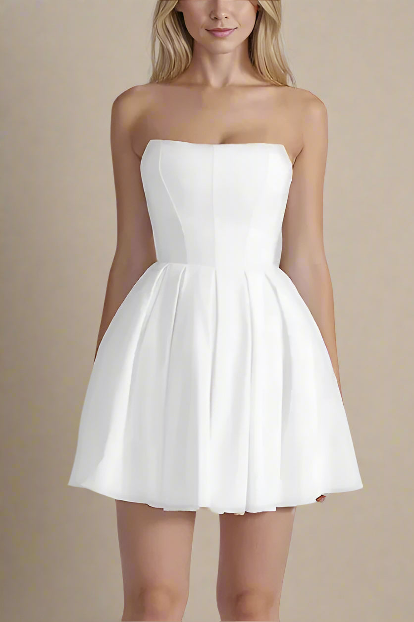 Woman wearing a figure flattering  Capri Bodycon Strapless Mini Dress - Pearl White BODYCON COLLECTION