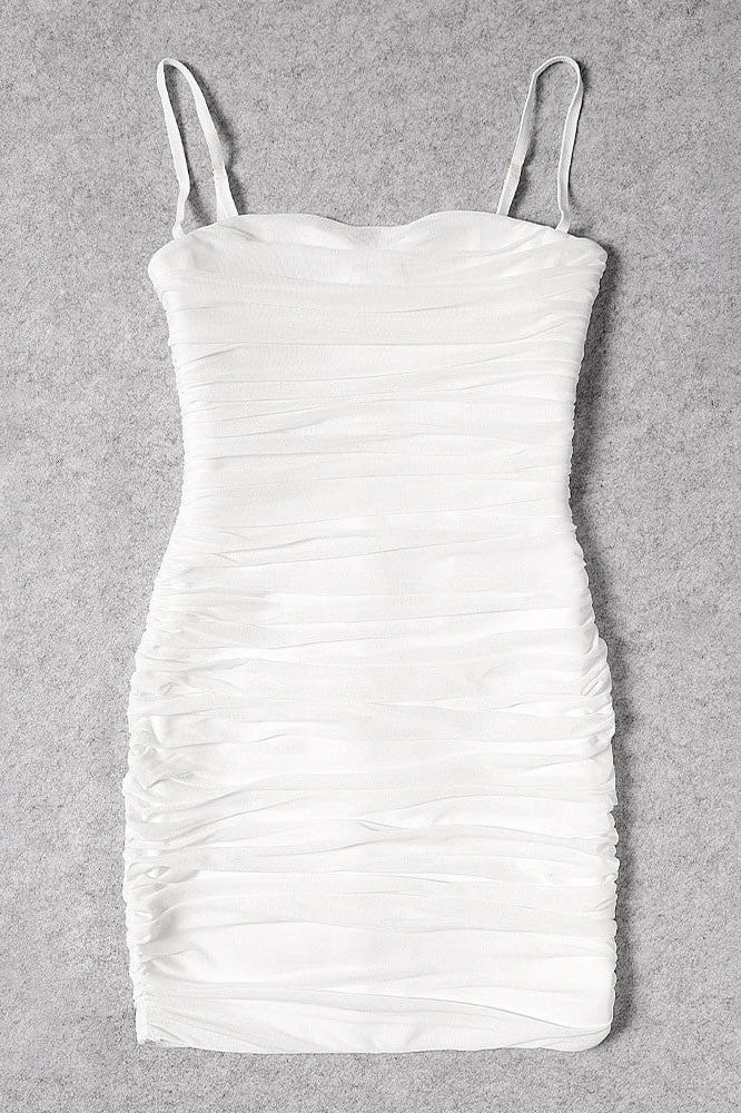 Woman wearing a figure flattering  Cassie Bodycon Wrap Mini Dress - Pearl White BODYCON COLLECTION