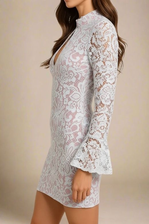 Woman wearing a figure flattering  Charlotte Long Sleeve Bodycon Mini Dress - White Pearl BODYCON COLLECTION