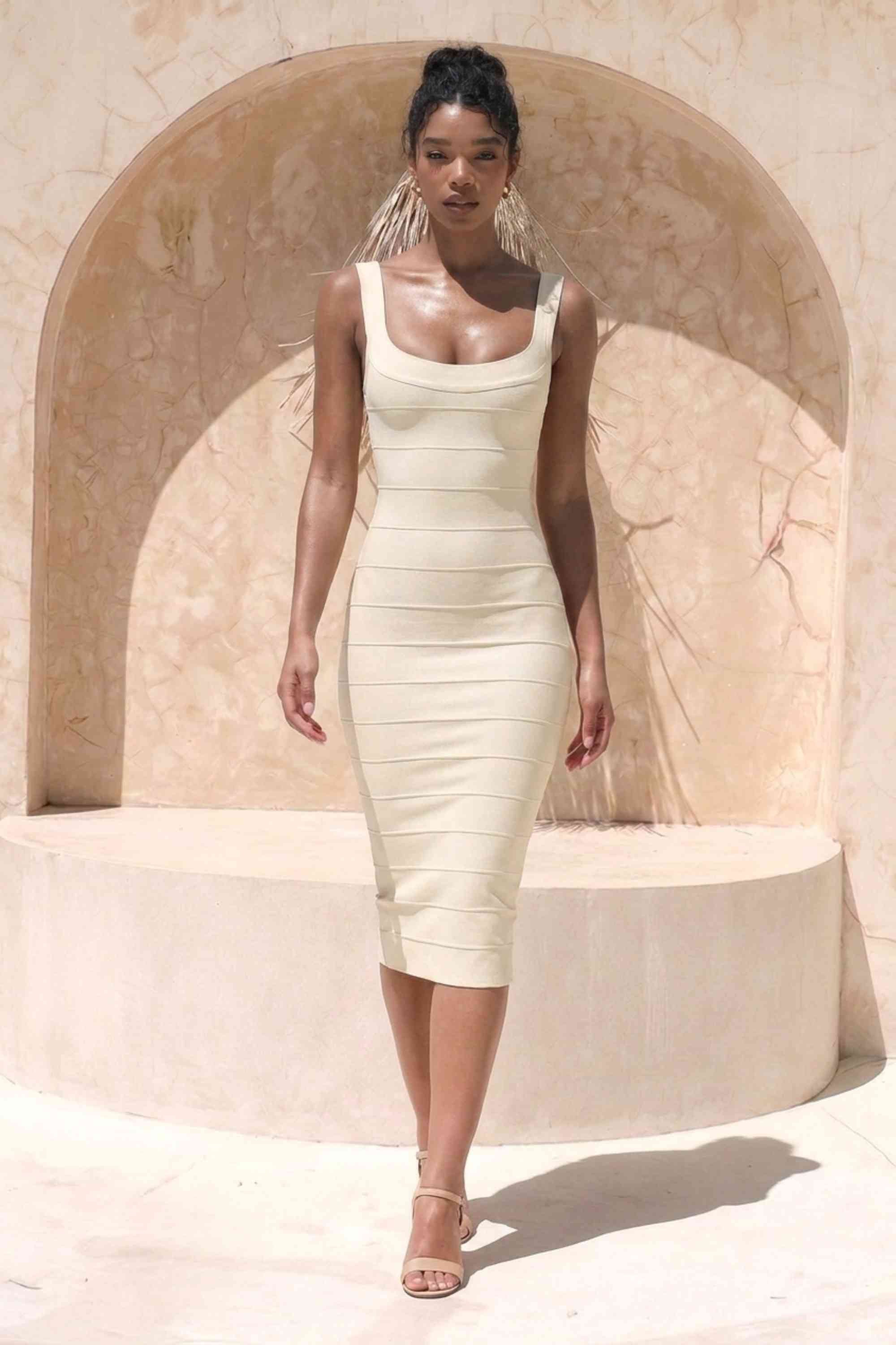 Woman wearing a figure flattering  Cindy Bandage Midi Dress - Cream BODYCON COLLECTION Pty Ltd