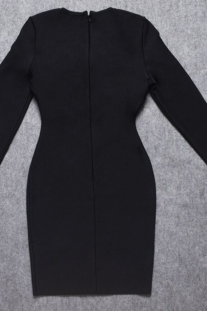 Woman wearing a figure flattering  Dani Long Sleeve Mini Bandage Dress - Classic Black BODYCON COLLECTION