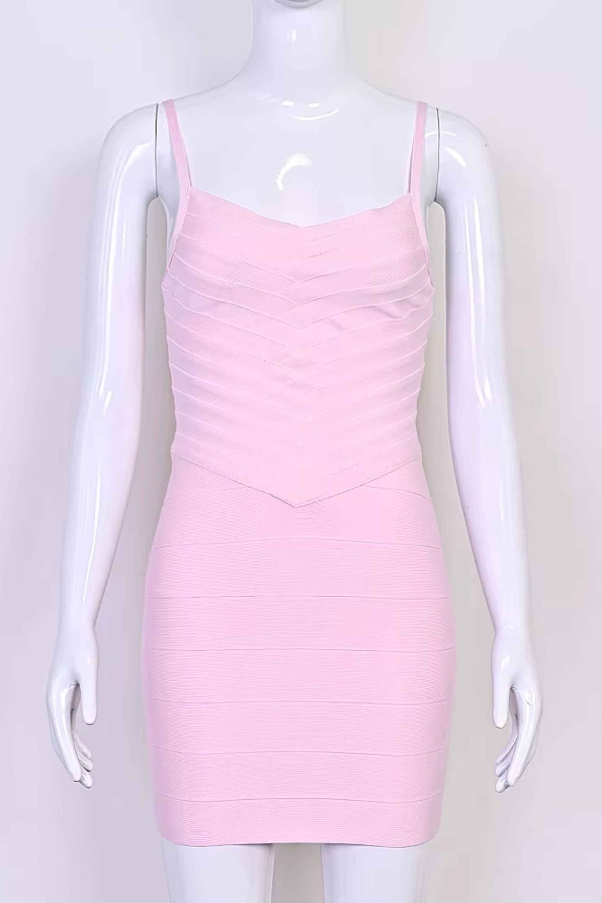 Woman wearing a figure flattering  Dom Bandage Mini Dress - Dusty Pink BODYCON COLLECTION Pty Ltd