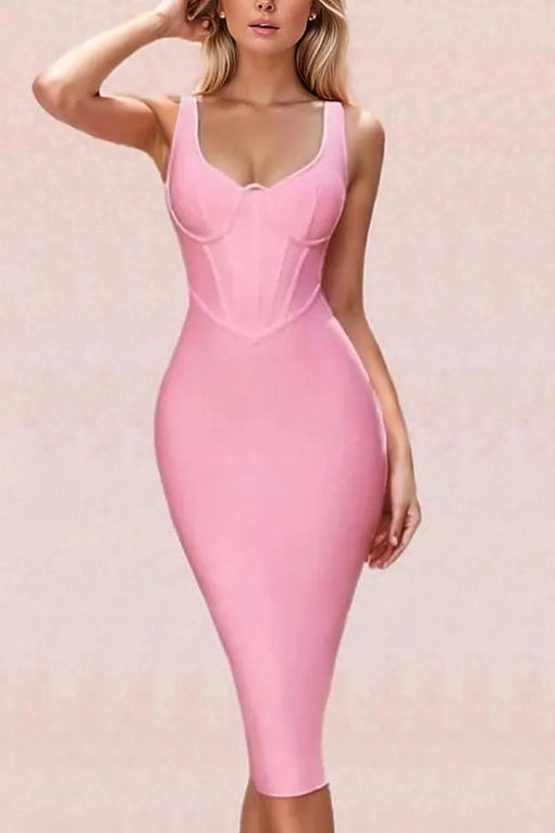 Woman wearing a figure flattering  Ellen Bandage Dress - Dusty Pink BODYCON COLLECTION