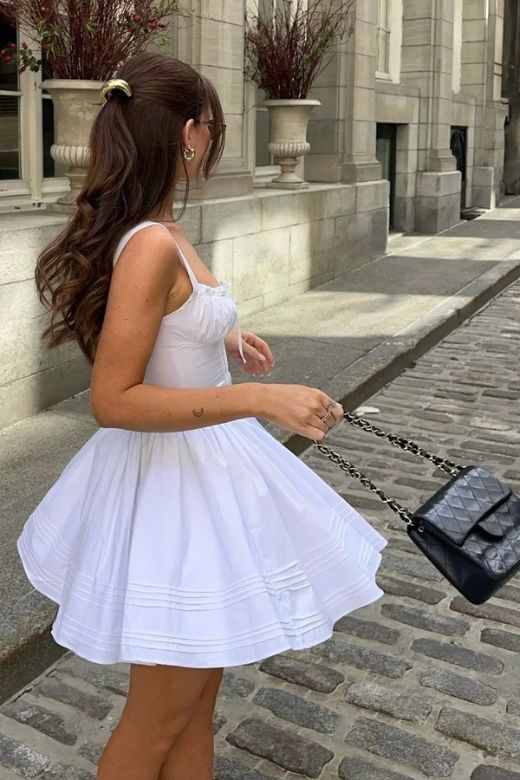 Woman wearing a figure flattering  Estelle Bodycon Mini Dress - Dusty Pink BODYCON COLLECTION Pty Ltd