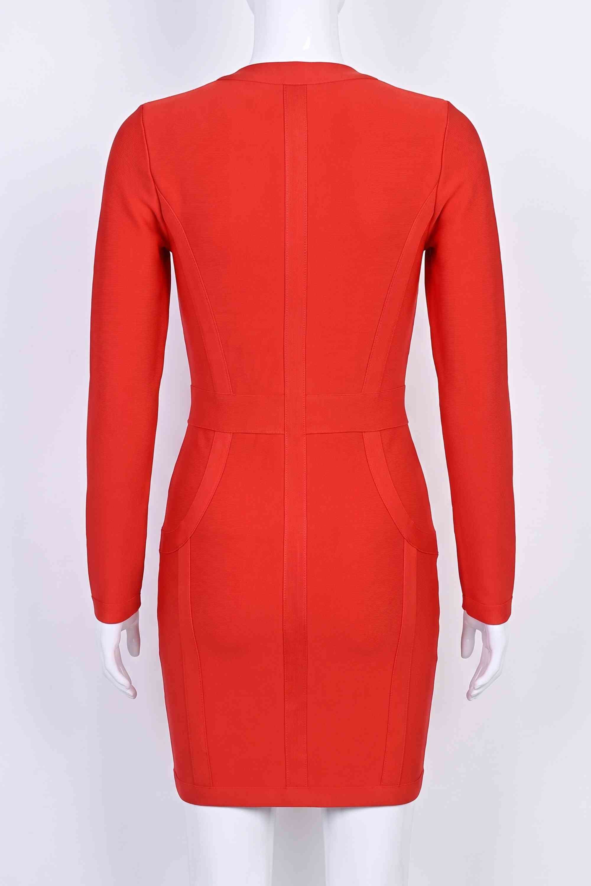 Woman wearing a figure flattering  Eva Long Sleeve Bandage Mini Dress - Lipstick Red BODYCON COLLECTION