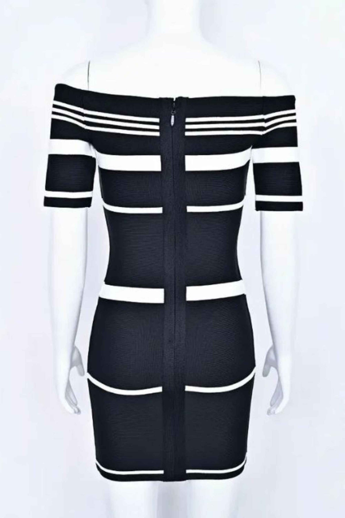 Woman wearing a figure flattering  Evelyn Bandage Mini Dress - Classic Black BODYCON COLLECTION Pty Ltd