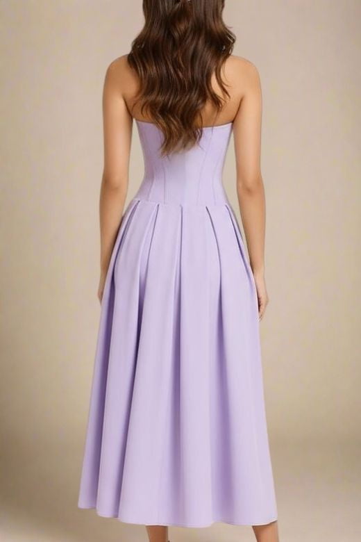 Woman wearing a figure flattering  Gabbi Bodycon Midi Dress - Lavender Purple BODYCON COLLECTION