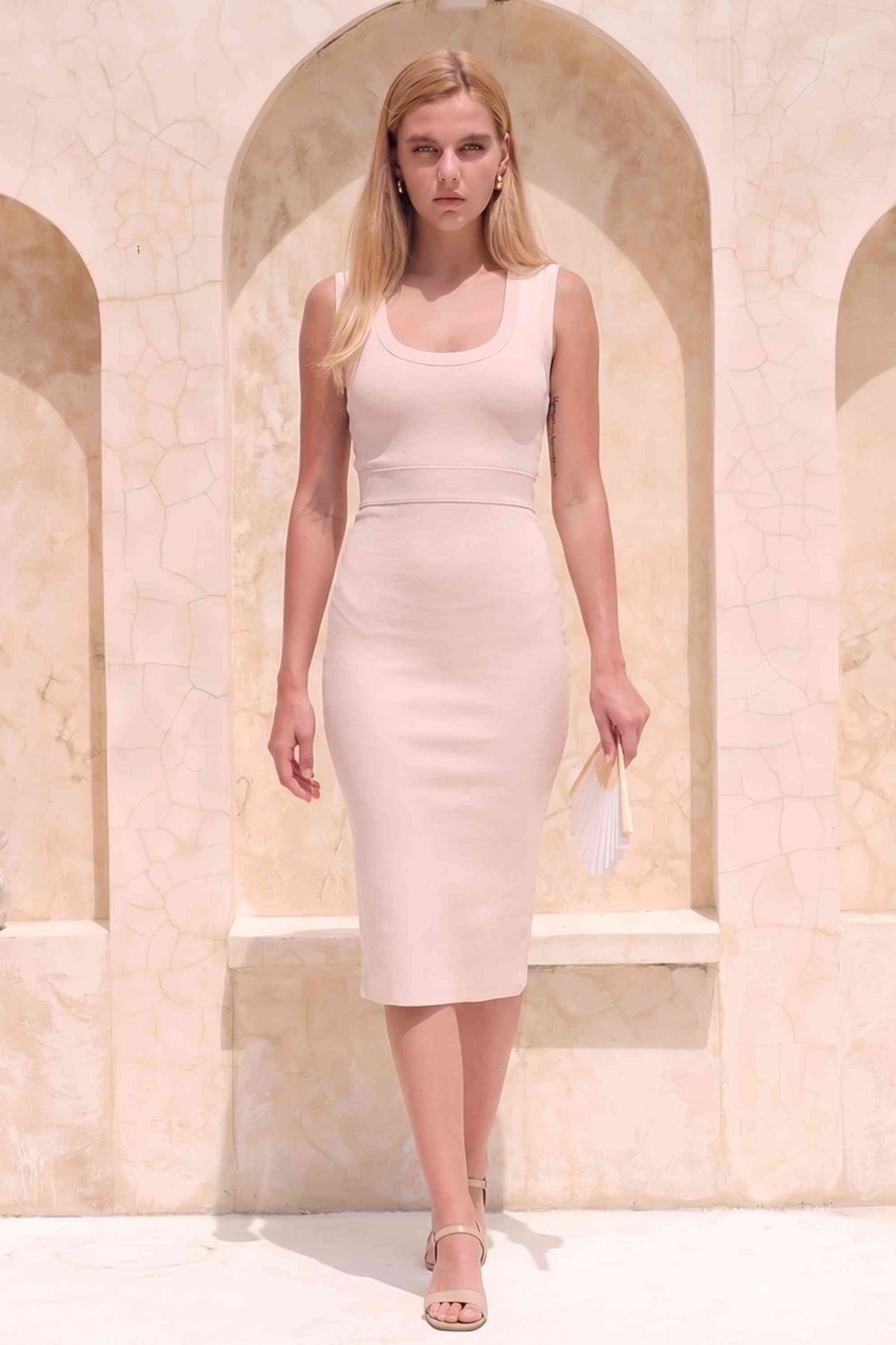 Woman wearing a figure flattering  Gracie Bandage Dress - Cream BODYCON COLLECTION Pty Ltd