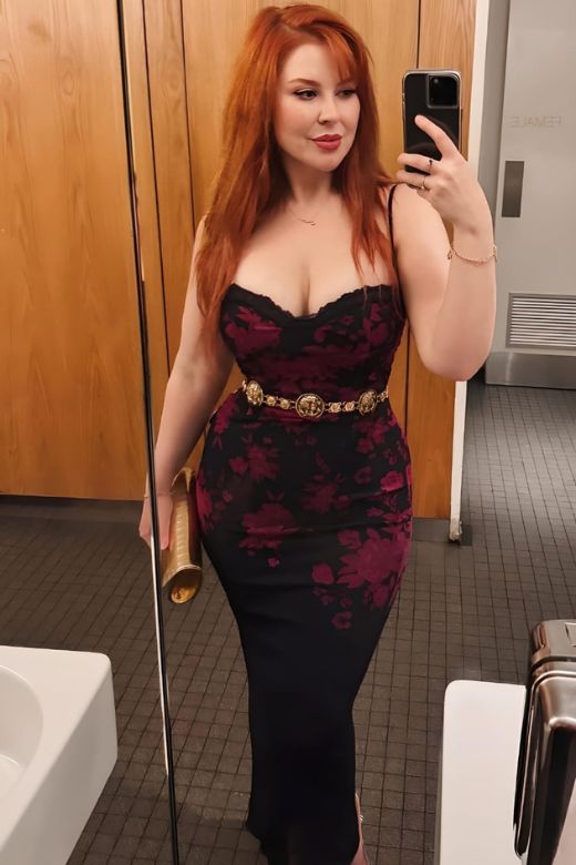 Woman wearing a figure flattering  Harmony Bodycon Midi Dress - Classic Black BODYCON COLLECTION