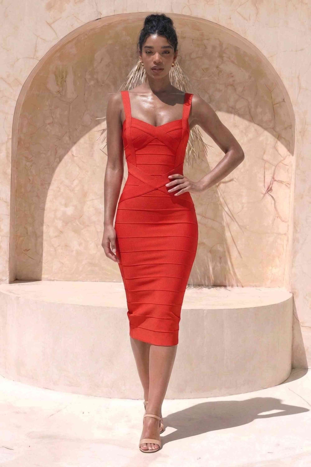 Woman wearing a figure flattering  Heidi Bandage Midi Dress - Lipstick Red Bodycon Collection