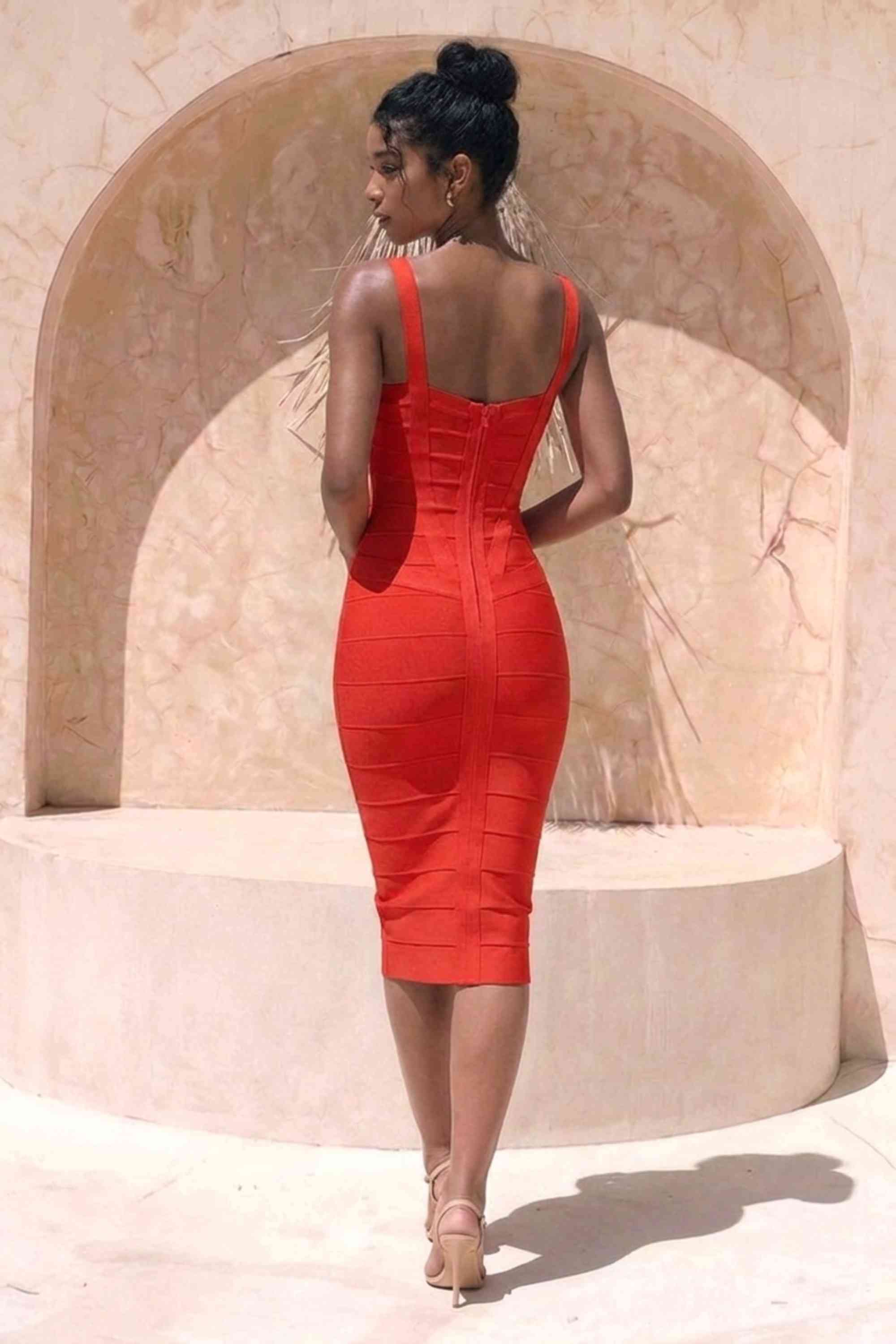Woman wearing a figure flattering  Heidi Bandage Midi Dress - Lipstick Red Bodycon Collection