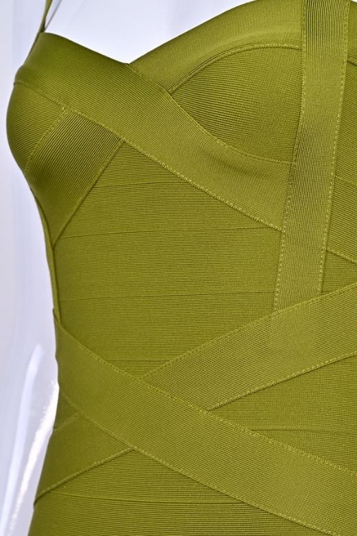 Woman wearing a figure flattering  Heidi Bandage Midi Dress - Olive Green Bodycon Collection