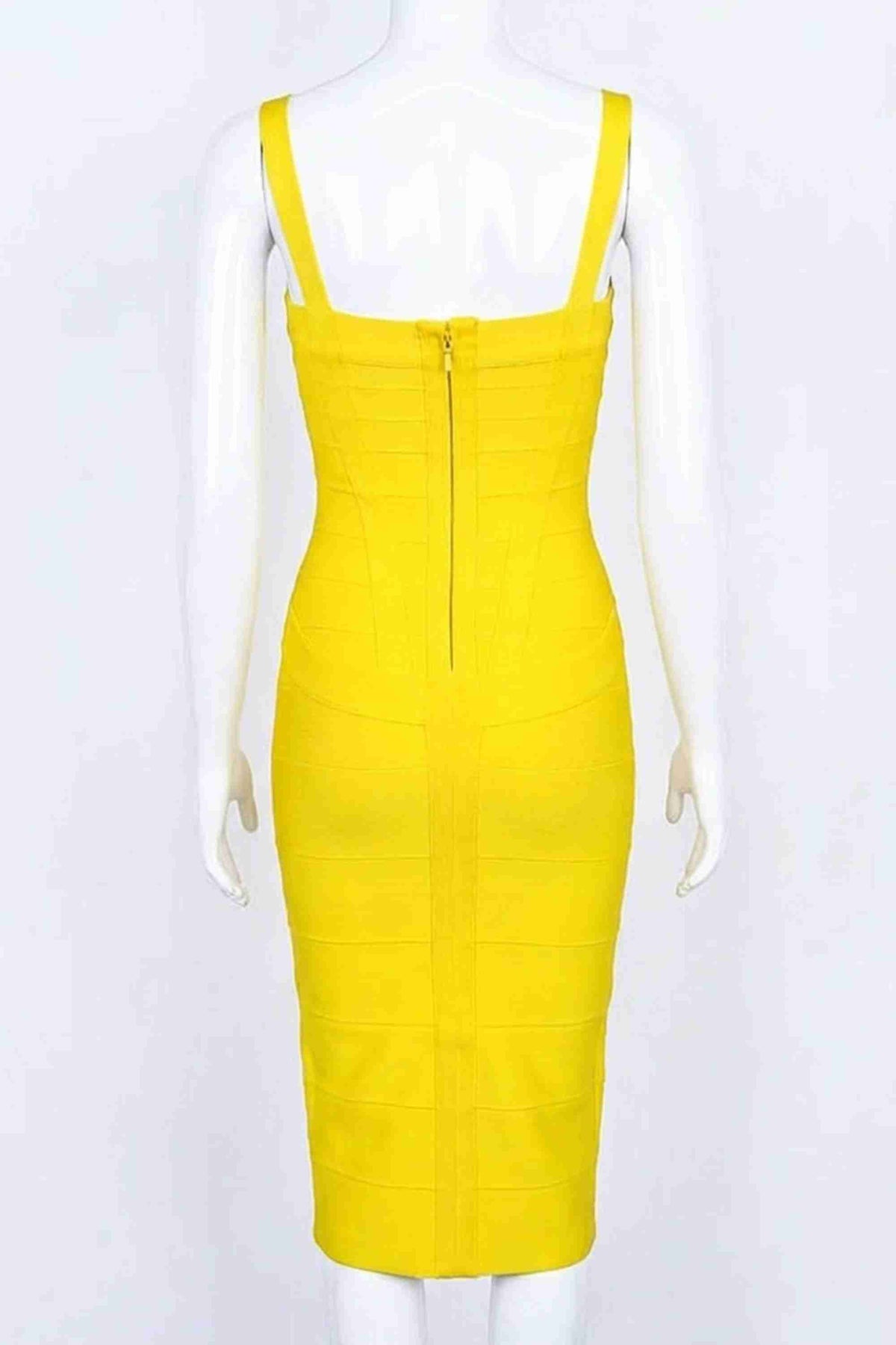 Woman wearing a figure flattering  Heidi Bandage Midi Dress - Sun Yellow Bodycon Collection
