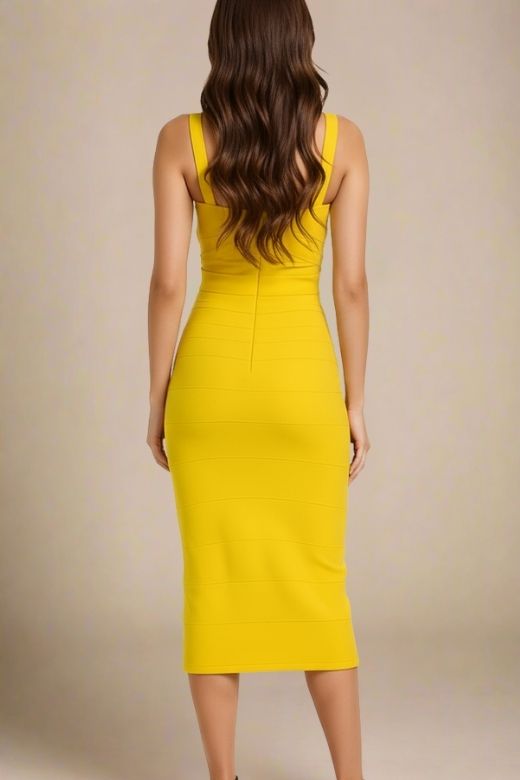 Woman wearing a figure flattering  Heidi Bandage Midi Dress - Sun Yellow Bodycon Collection