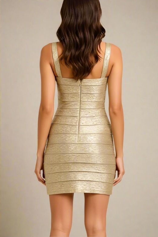 Woman wearing a figure flattering  Heidi Bandage Mini Dress - Gold Bodycon Collection